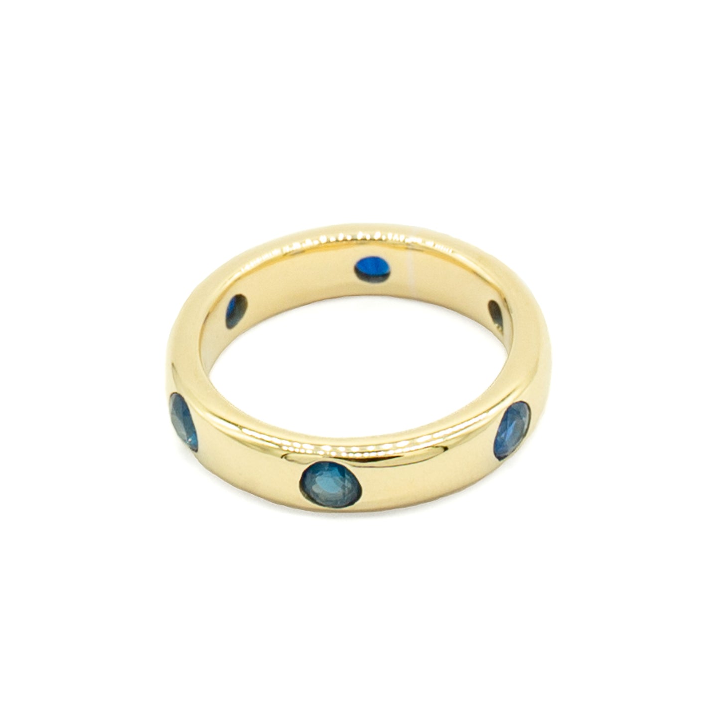 Stunning 12ct gold eternity ring set with six beautiful blue faceted sapphires.