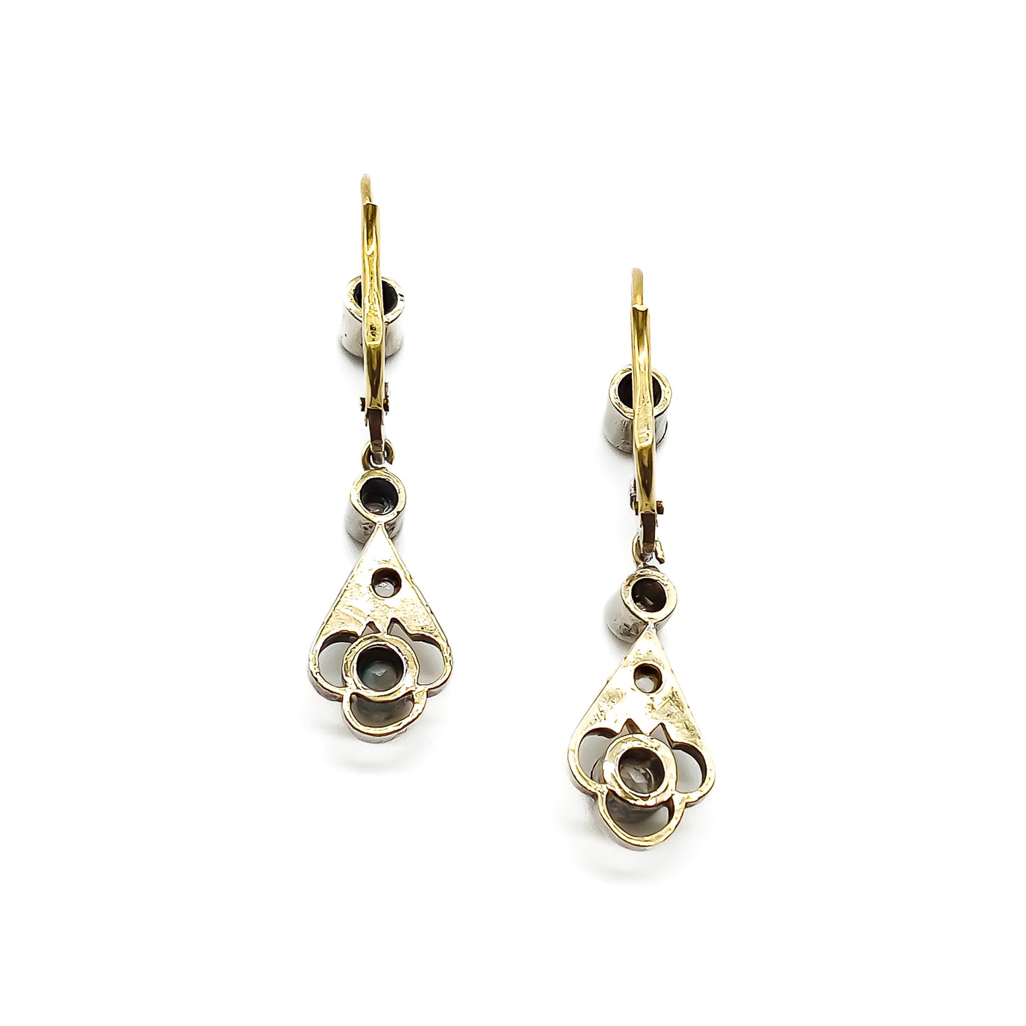 Elegant 14ct white and yellow gold drop earrings, each set with four old-cut diamonds. Circa 1900’s