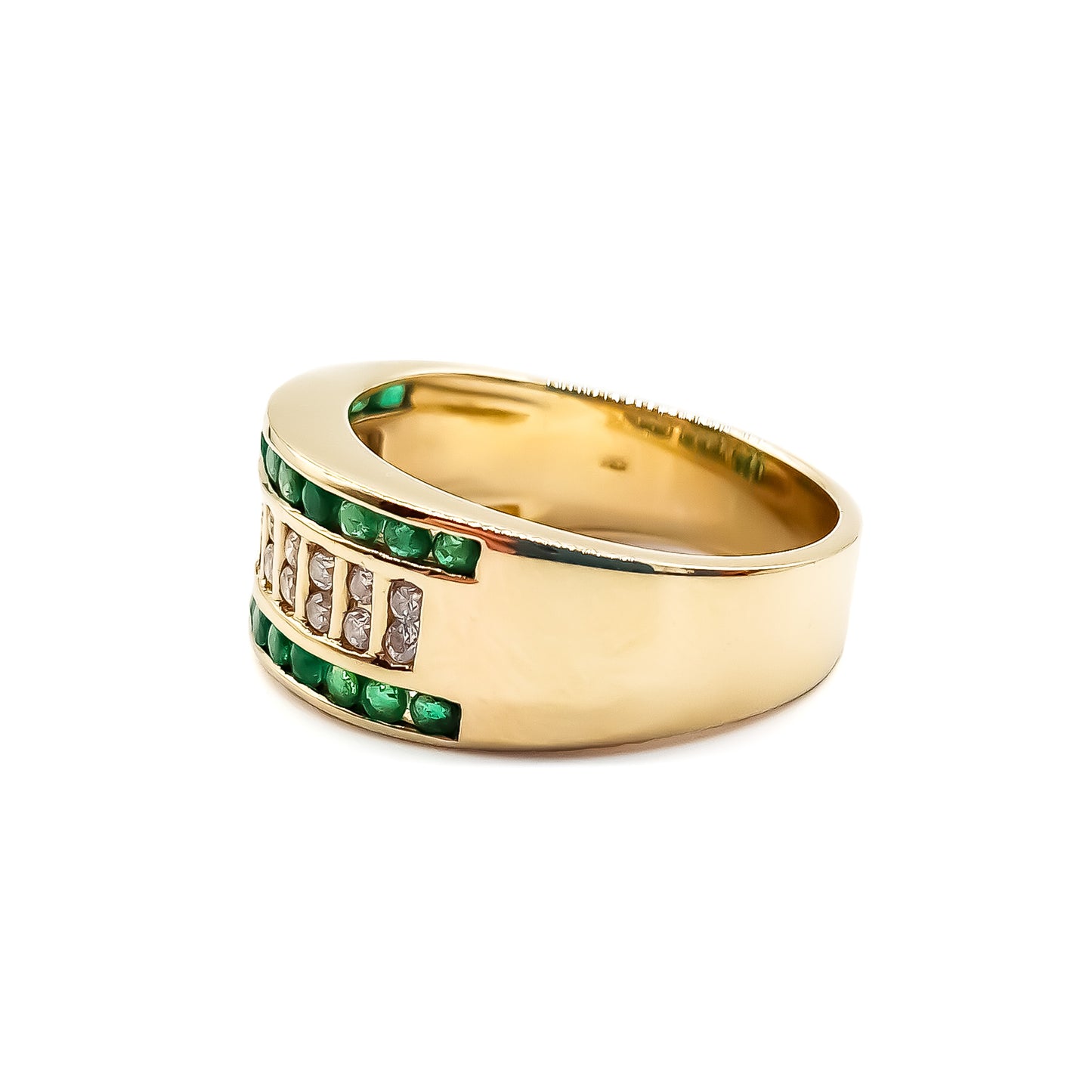 Stunning 14ct yellow gold ring with twenty-four round emeralds and twenty-two small round diamonds in a channel setting.