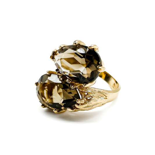 Stunning 14ct gold ring set with two beautifully faceted pear-shaped smoky quartz gemstones.