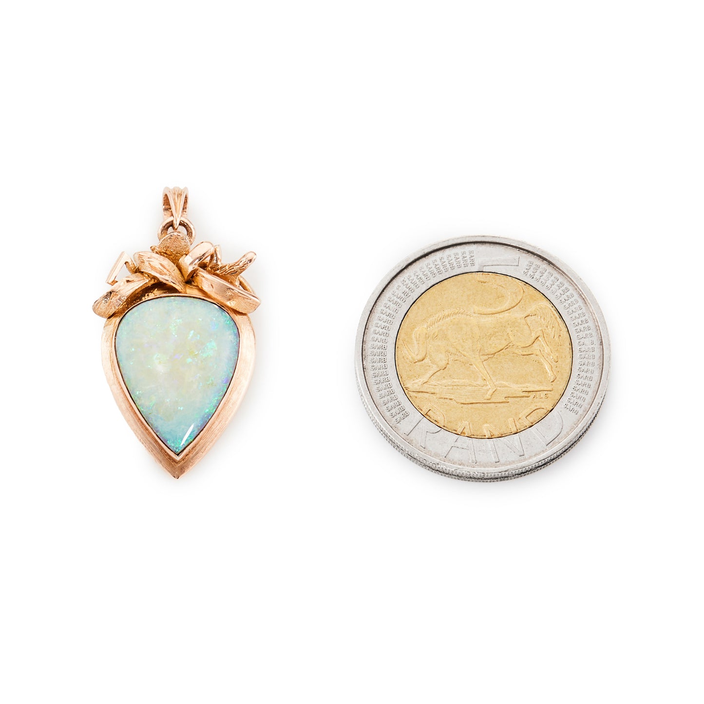 Lovely 14ct rose gold pendant set with a luminous opal.