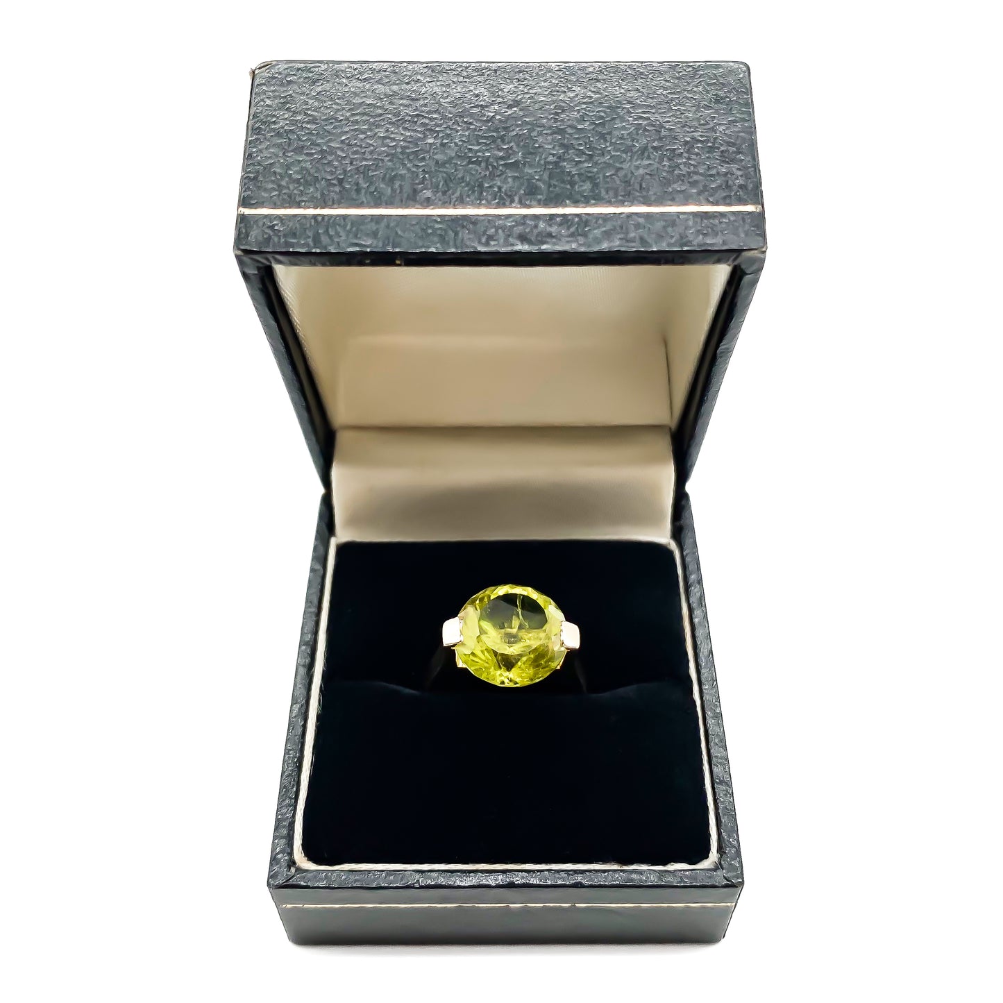 Stylish 14ct rose gold ring set with beautifully faceted bright green peridot stone.