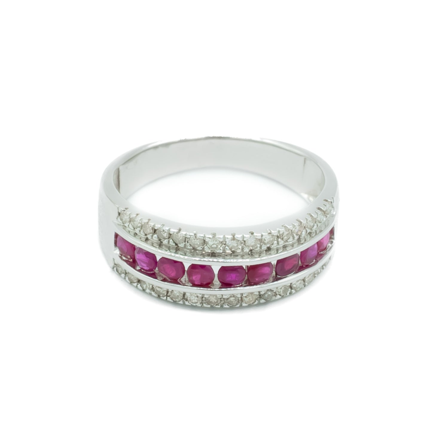 Classic vintage 14ct white gold ring set with nine faceted rubies and two rows of small diamonds. London