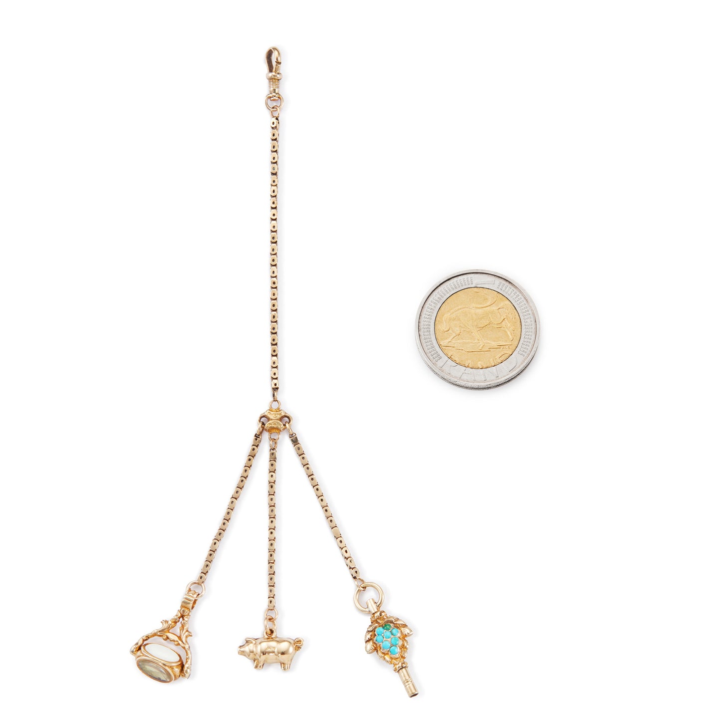 Highly sought after Victorian 15ct yellow gold attachment consisting of a dog clip, and three exquisite miniature pieces hanging from individual chains. The attachment consists of: a beautifully carved 15ct gold turquoise watch key, a 9ct gold pig charm and a 15ct gold swivel fob set with citrine, green agate and white chalcedony. Can be worn as a pendant or attached onto an Albertina.