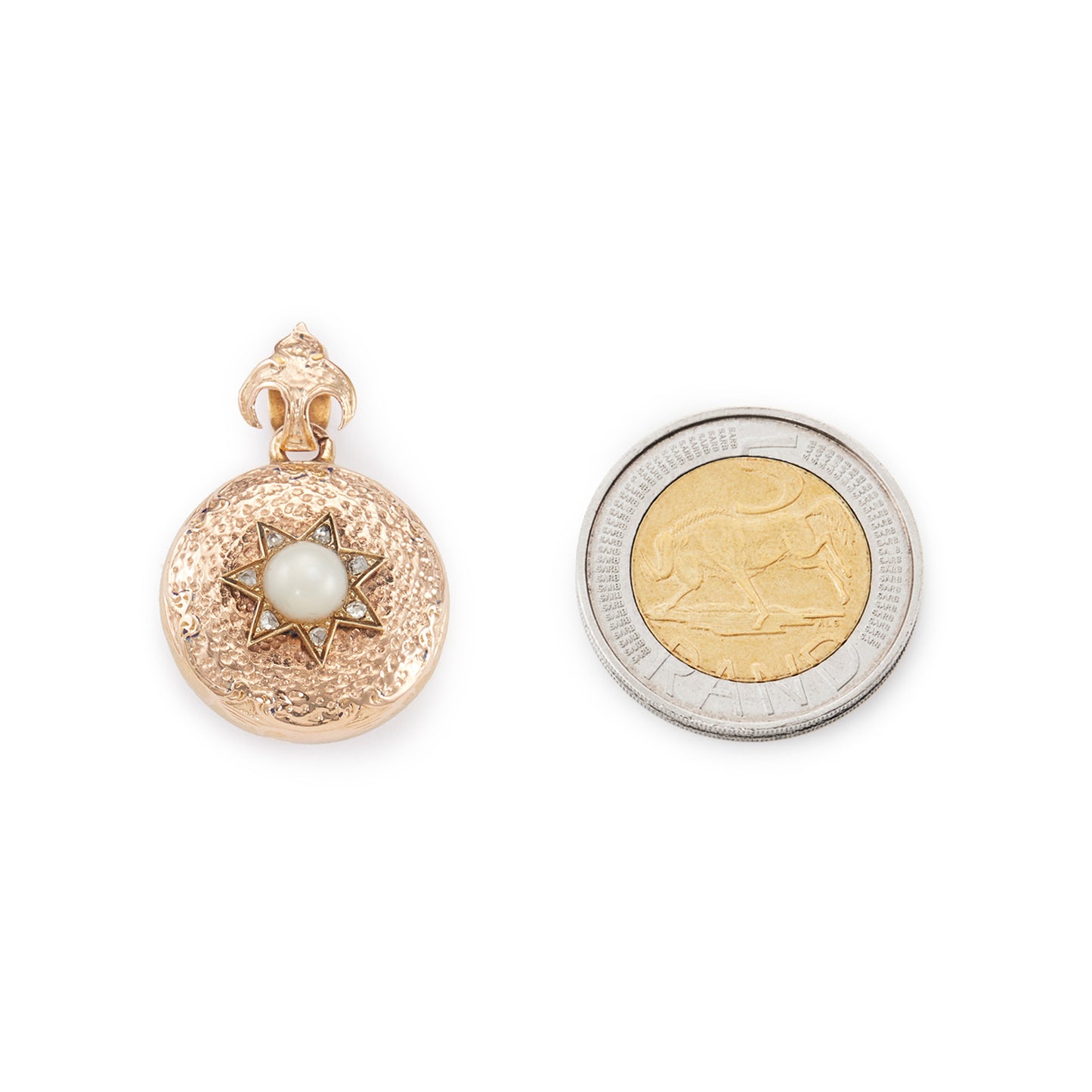 Pretty Victorian 9ct rose gold hammered-texture pendant with a pearl set in a six pointed diamond star, and a bird motif on the bale. A lock of hair rests behind glass at the back of the pendant.