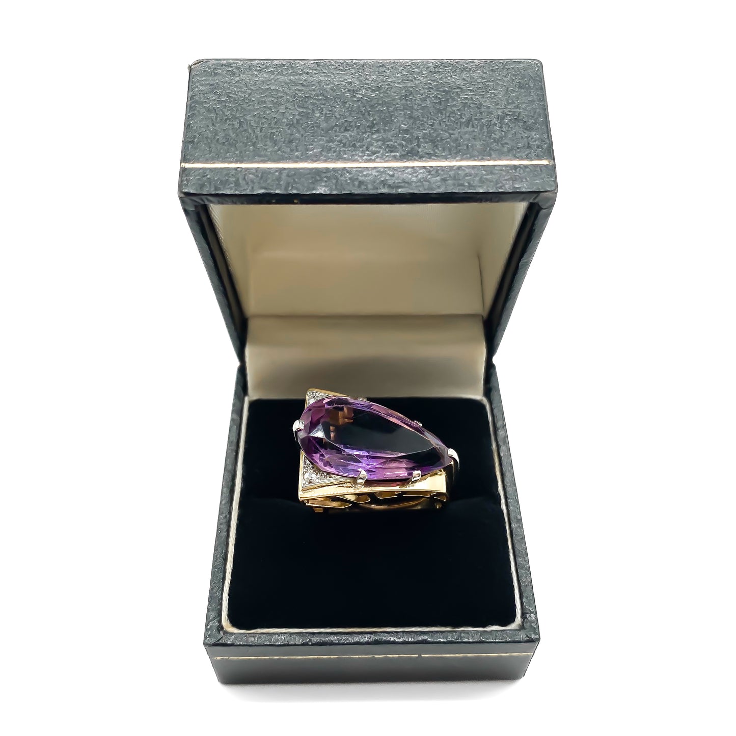 Very stylish 18ct gold ring set with a beautifully faceted pear-shaped amethyst and two small diamonds. Circa 1970's