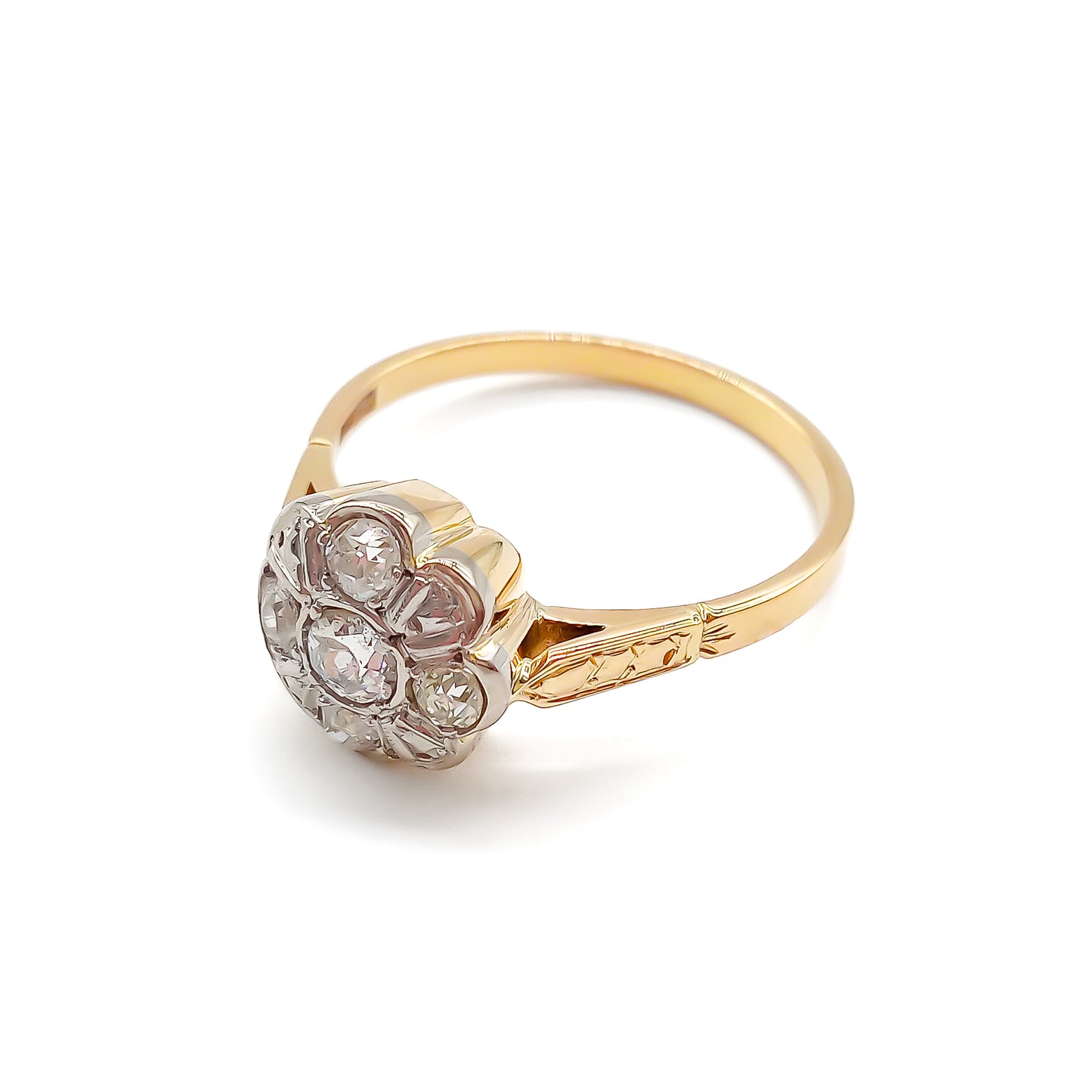 Dainty 18ct gold ring with five old-cut diamonds set in the shape of a flower.