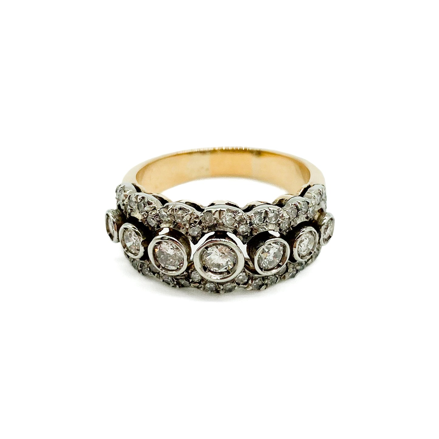 Magnificent 18ct yellow and white gold half eternity ring set with a middle row of seven diamonds, surrounded by forty-six tiny diamonds. Circa 1930’s