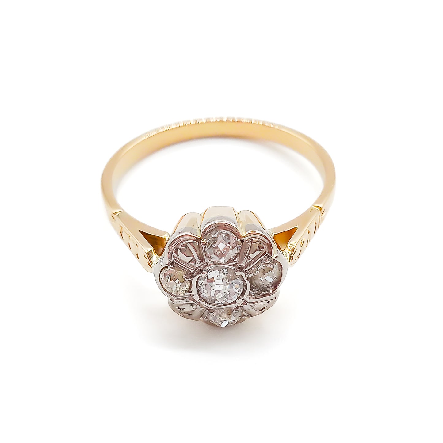 Dainty 18ct gold ring with five old-cut diamonds set in the shape of a flower.