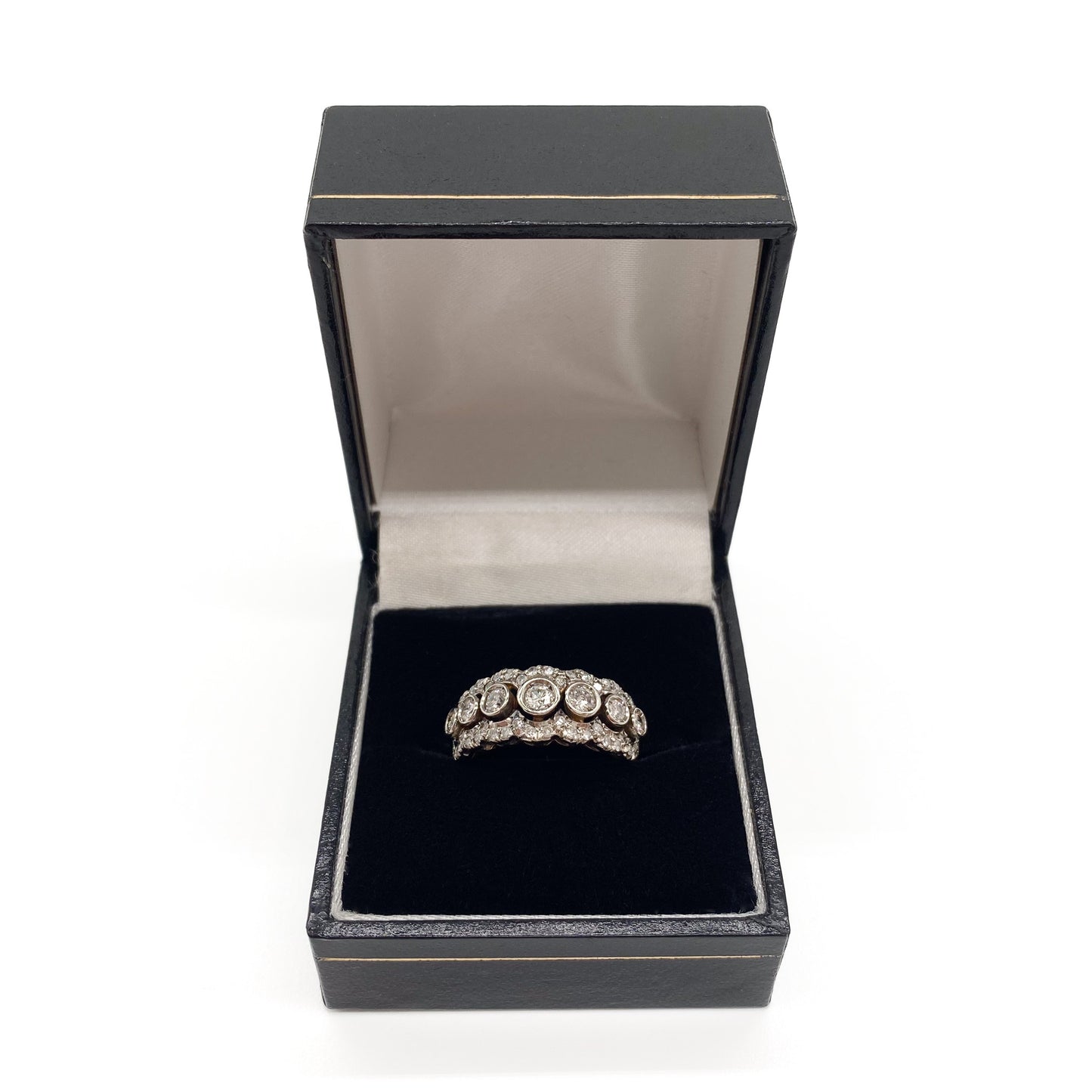 Magnificent 18ct yellow and white gold half eternity ring set with a middle row of seven diamonds, surrounded by forty-six tiny diamonds. Circa 1930’s