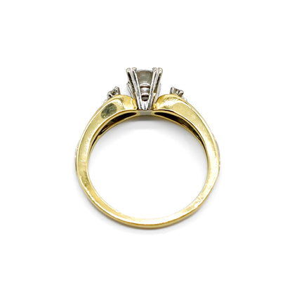 Classic 18ct yellow and white gold trilogy engagement ring set with three diamonds.   Circa 1950’s