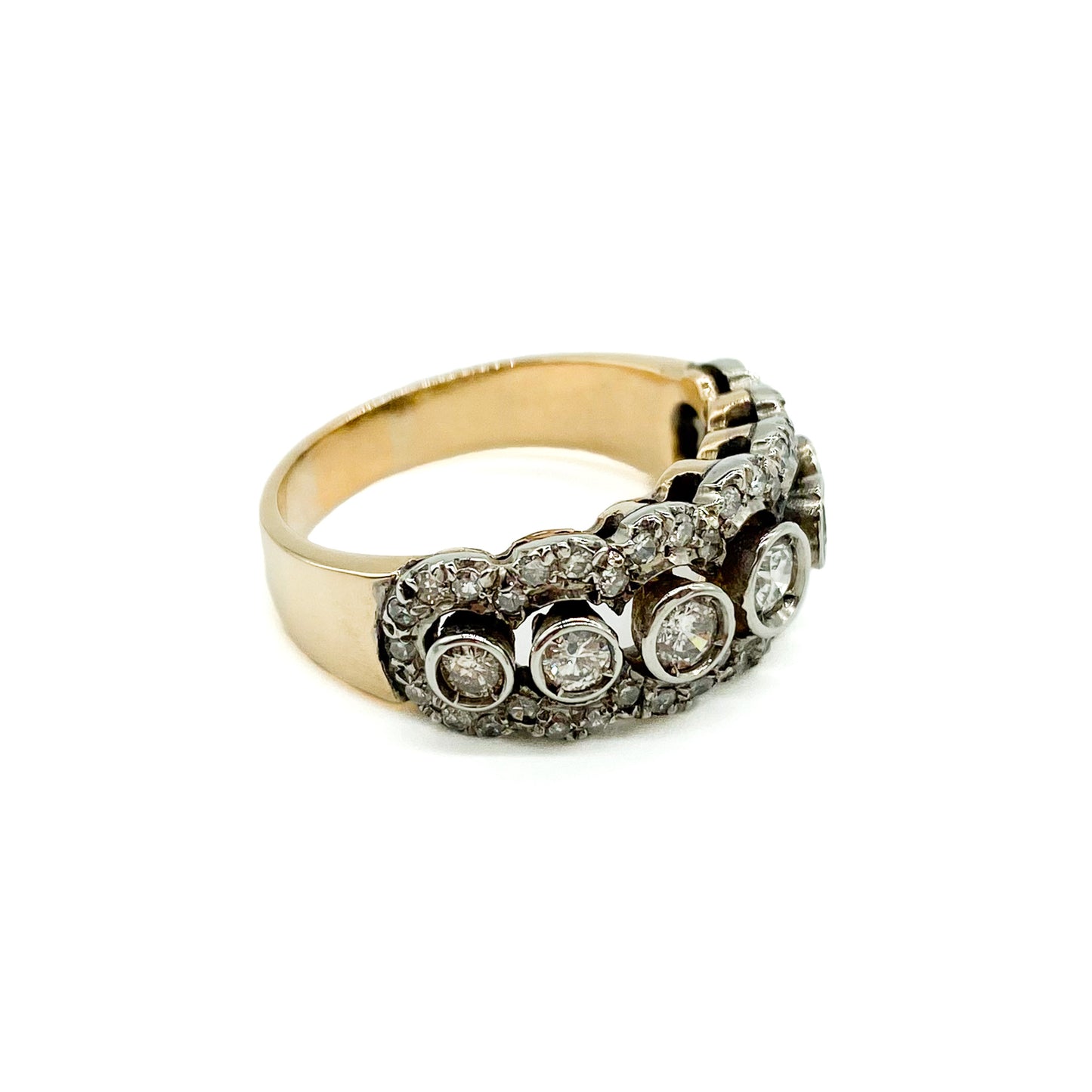 Magnificent 18ct yellow and white gold half eternity ring set with a middle row of seven diamonds, surrounded by forty-six tiny diamonds. Circa 1930’s