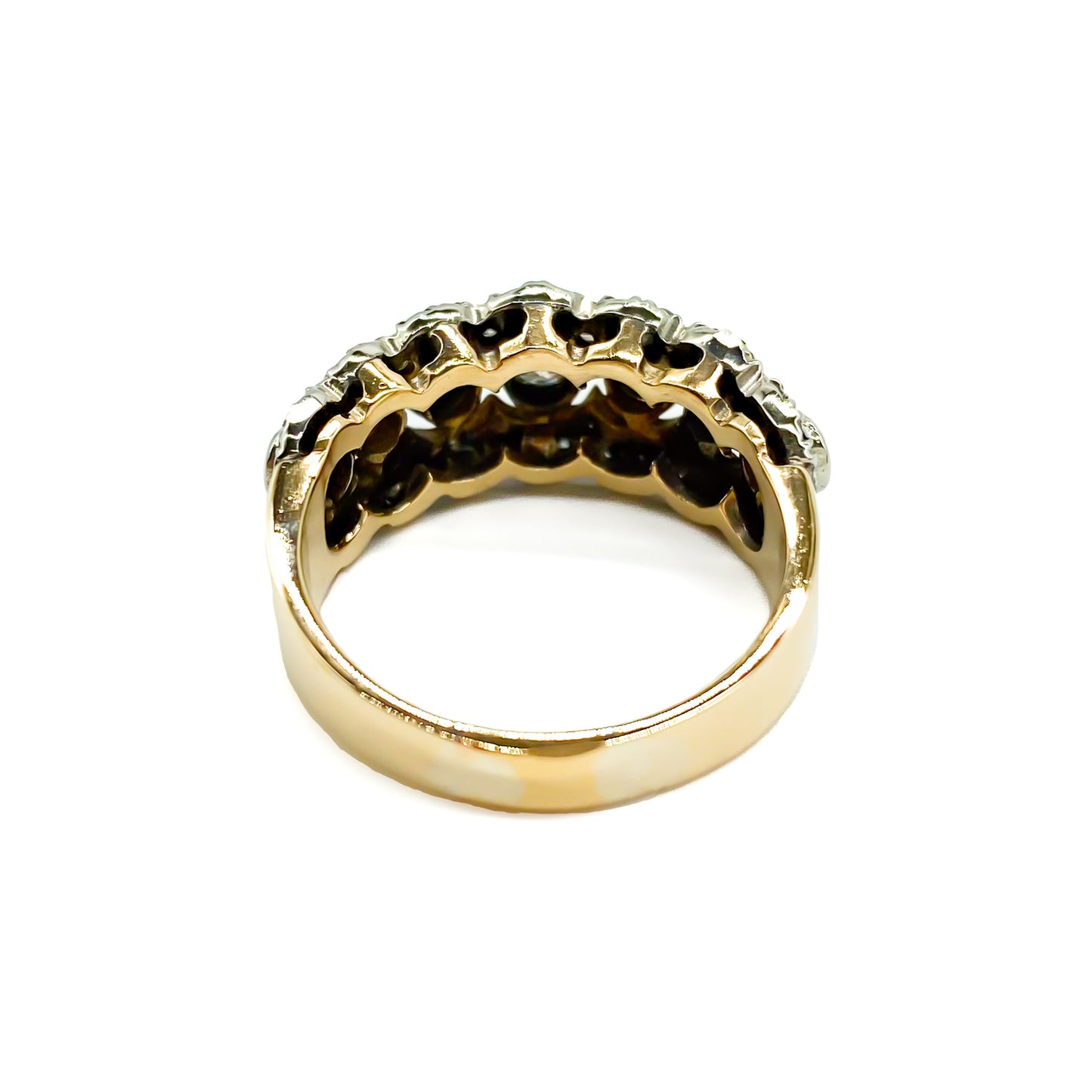 Magnificent 18ct yellow and white gold half eternity ring set with a middle row of seven diamonds, surrounded by forty-six tiny diamonds. Circa 1930’s