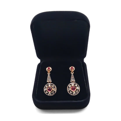 Gorgeous 18ct Gold and Silver earrings, each set with two faceted rubies and diamond chips. Italy
