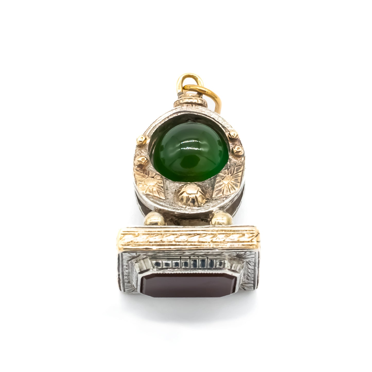 Very ornate 18ct gold and silver Victorian fob pendant set with a carnelian disc and a jade bead. Lovely engraving. Italy