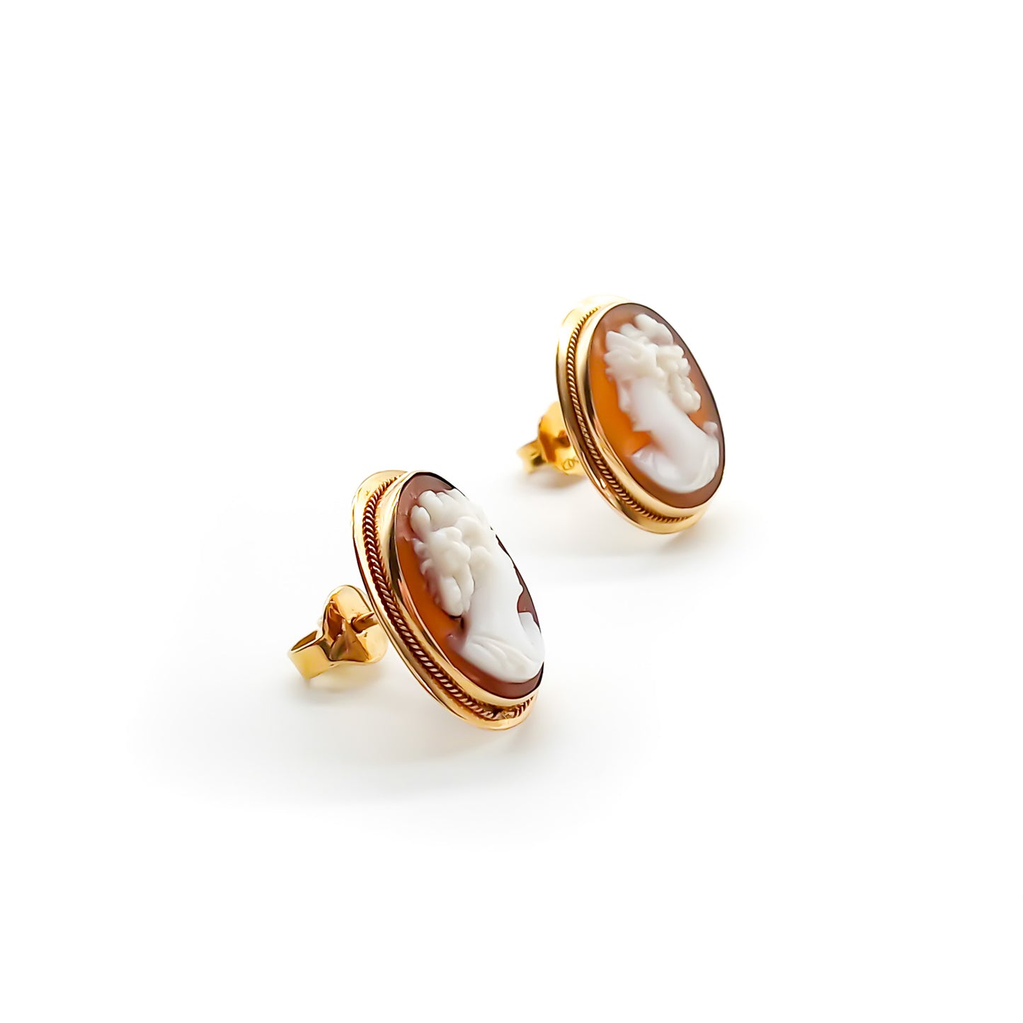 Classic 18ct rose gold stud earrings set with beautifully carved cameos.