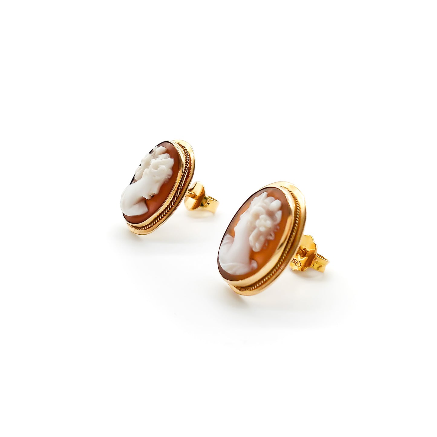 Classic 18ct rose gold stud earrings set with beautifully carved cameos.