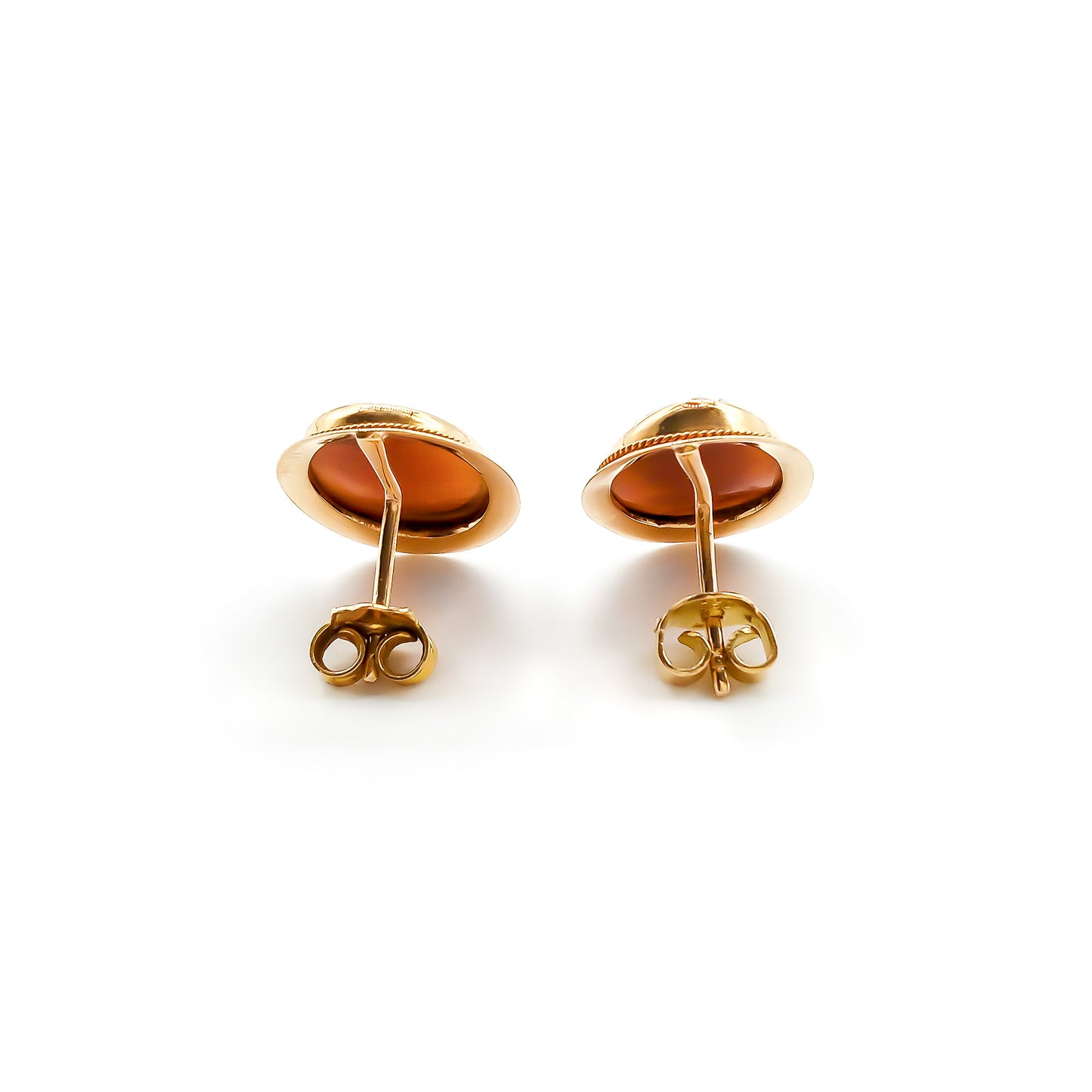 Classic 18ct rose gold stud earrings set with beautifully carved cameos.