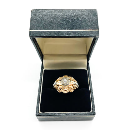 Glamorous 18ct rose gold cocktail ring with platinum detail and a 0.15ct old-cut diamond in a star setting. Argentina  Circa 1940’s