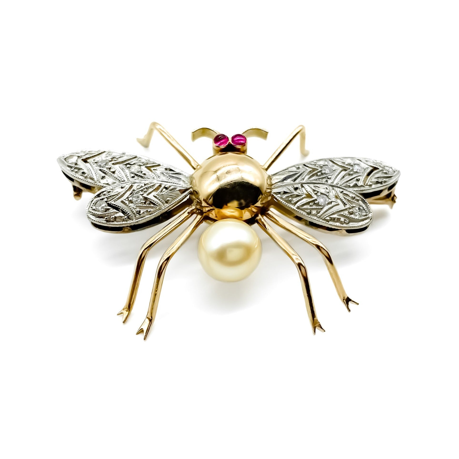 Exquisite 18ct rose gold insect brooch with diamond encrusted wings, ruby eyes and a pearl. 