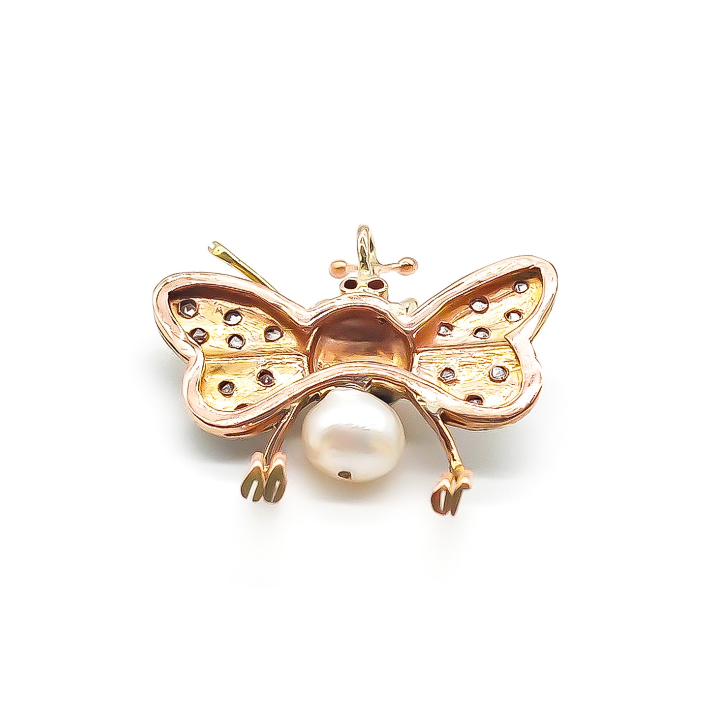 Exquisite 18ct rose gold insect pendant with white gold diamond encrusted wings, ruby eyes and a pearl body. Circa 1940’s