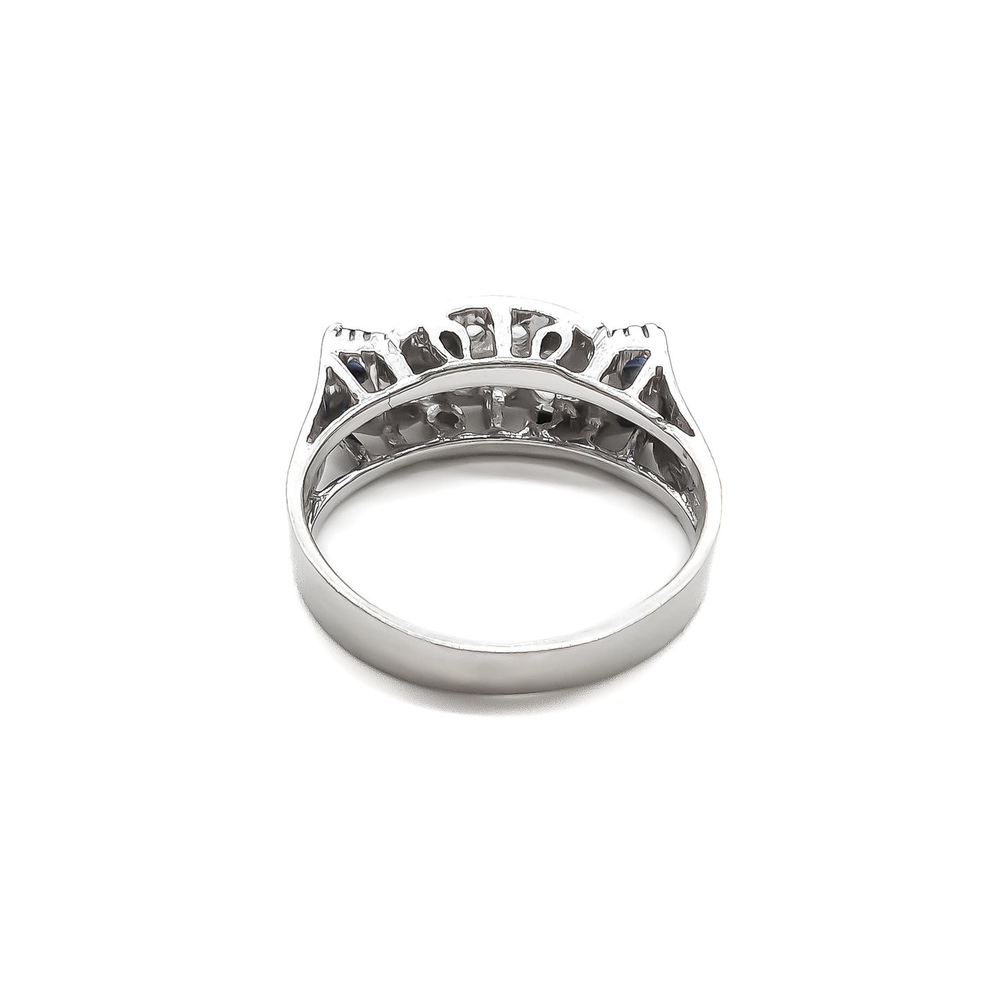 Stylish 18ct white gold ring set with four rectangular sapphires and eight round diamonds.