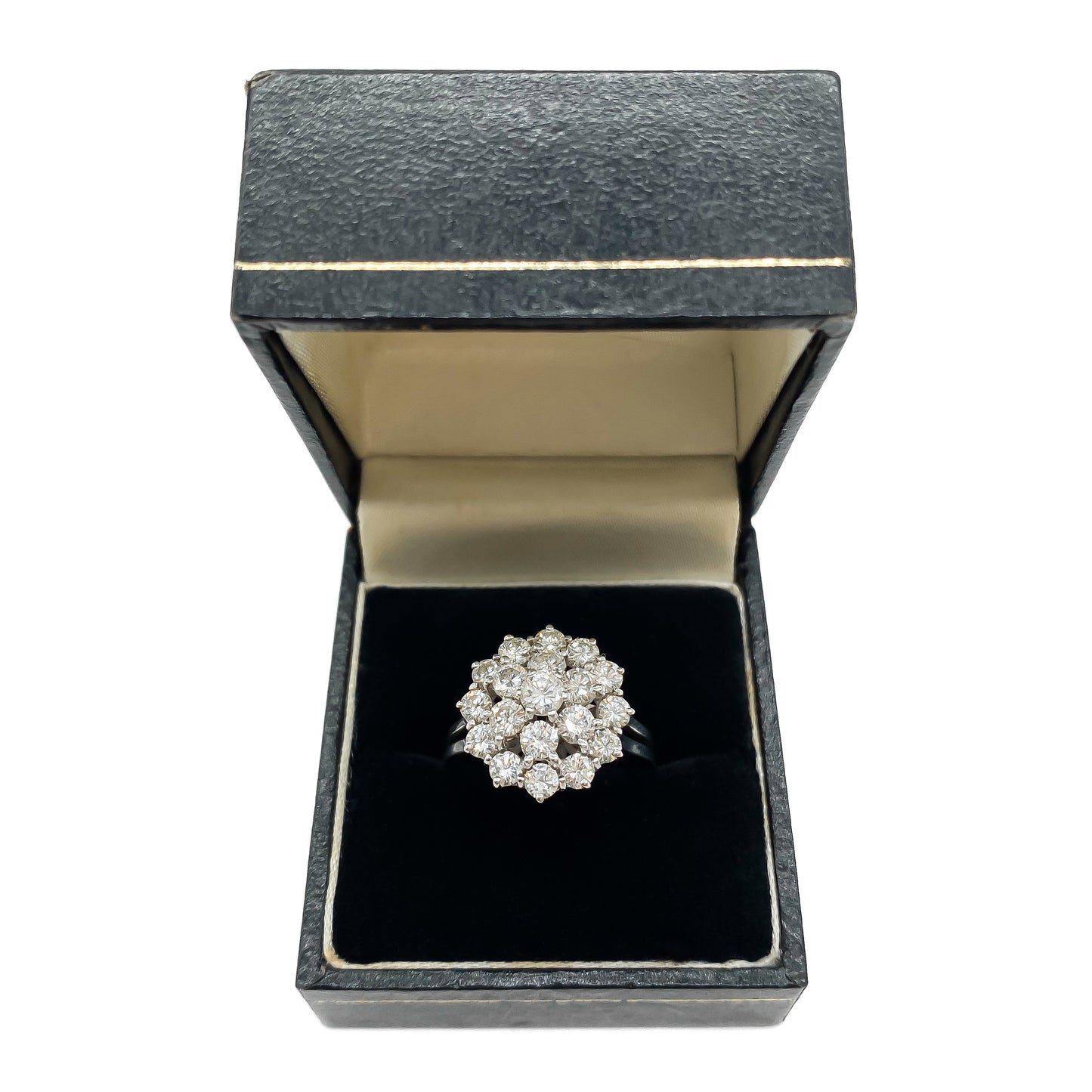 Glamorous 18ct white gold ring with nineteen sparkling diamonds in a cluster tier setting. Size: P