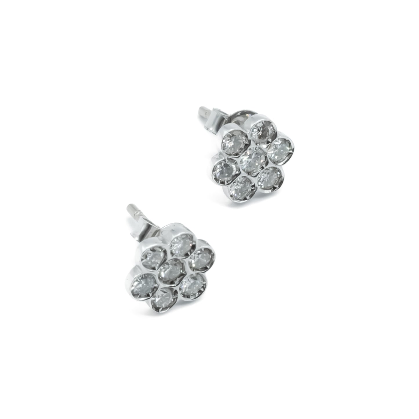 Classic 18ct white gold flower shaped stud earrings, each set with seven diamonds.