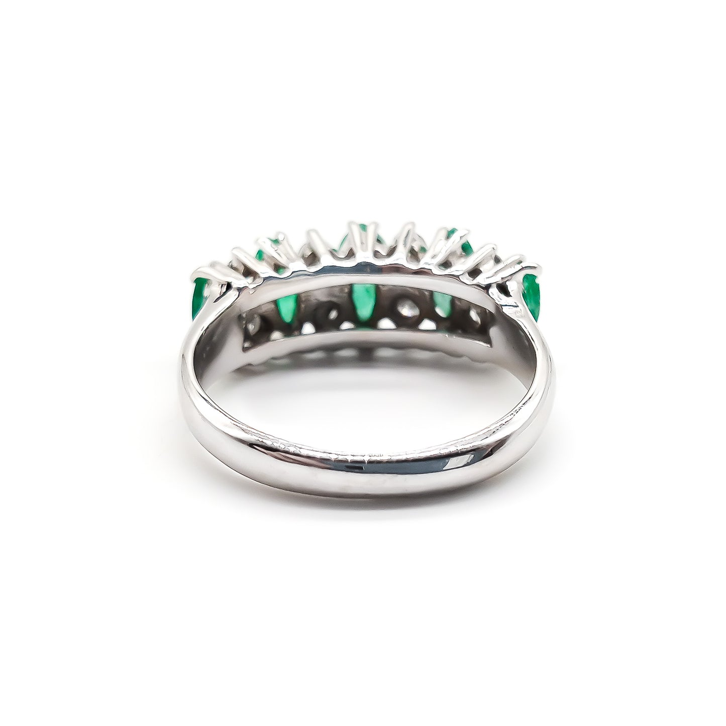 Stunning vintage 18ct white gold ring set with five marquise-cut emeralds and eight round diamonds.