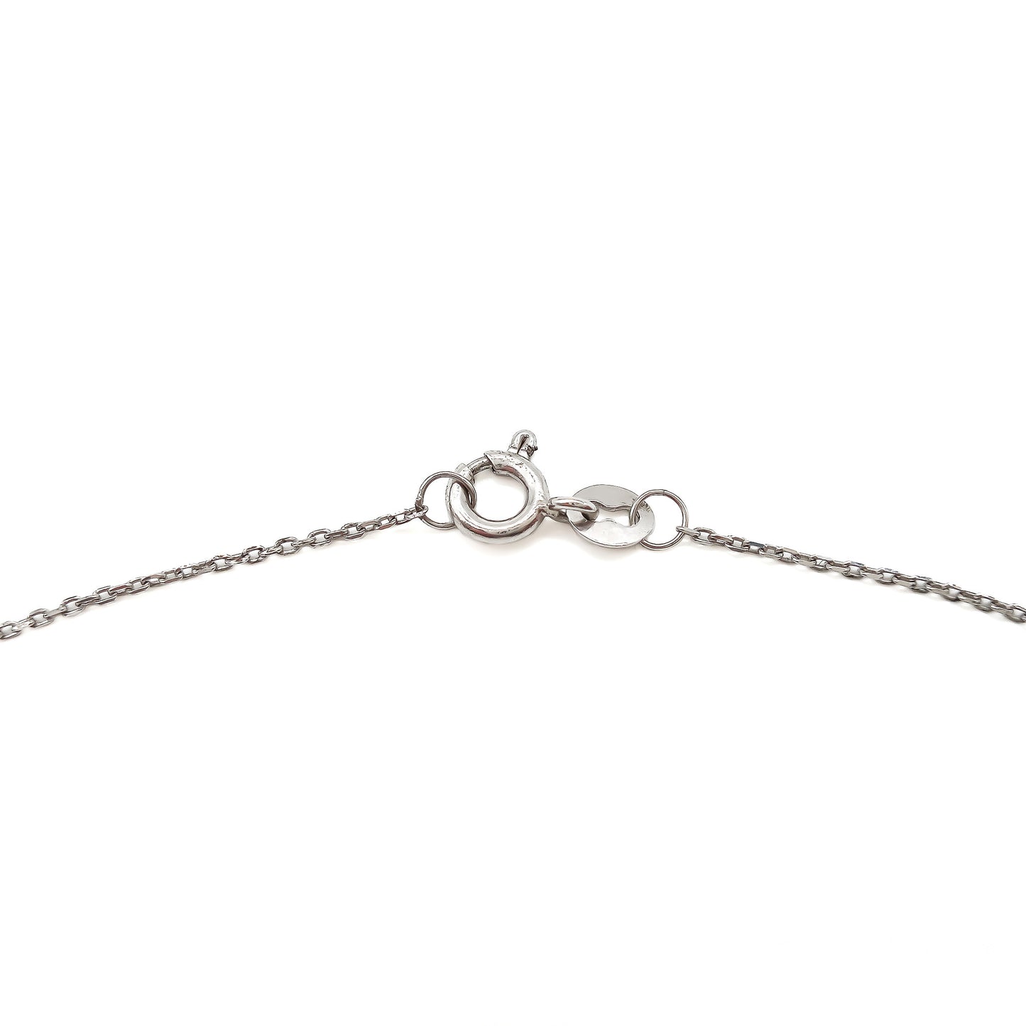 Delicate 18ct white gold pendant set with three small diamonds and a beautiful oval moonstone, on an 18ct white gold chain.