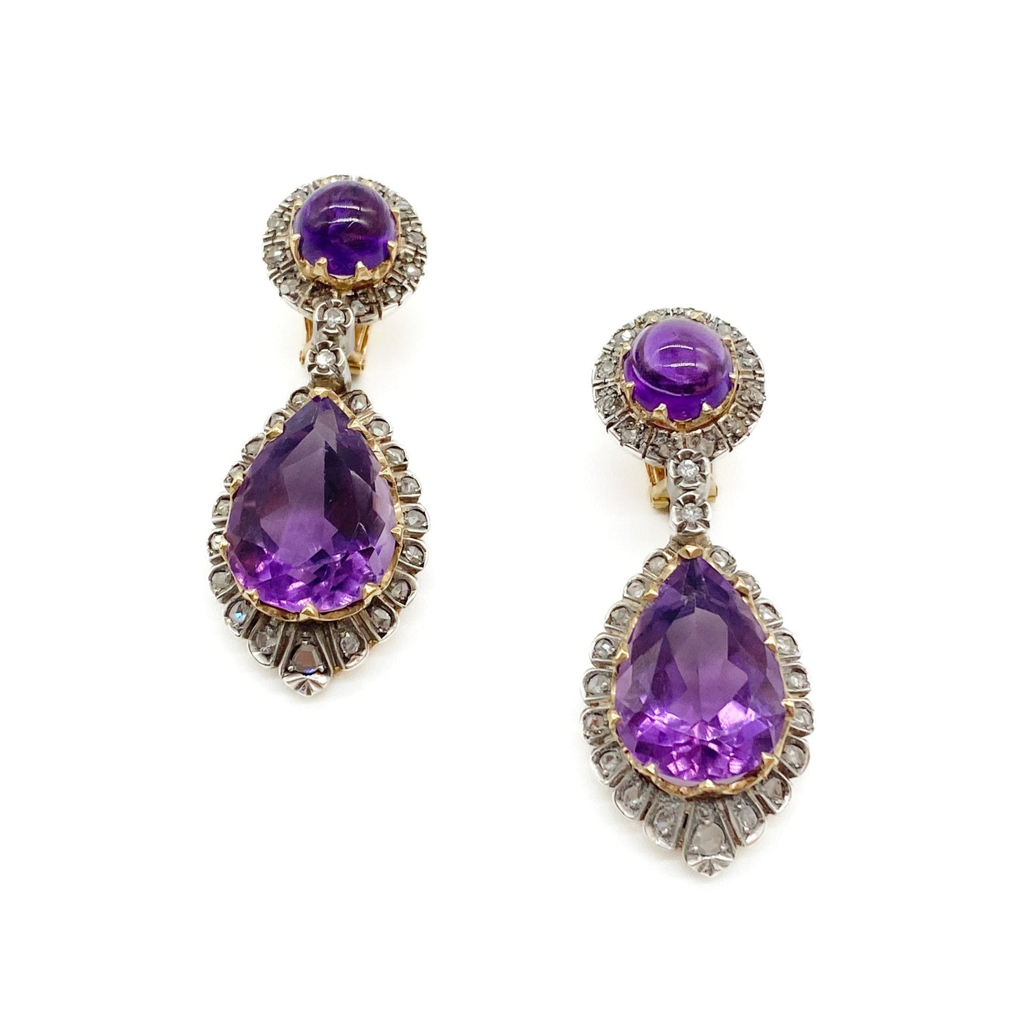 Magnificent antique 18ct yellow gold and silver articulated drop earrings, each set with a teardrop shaped faceted amethyst and a round cabochon amethyst, surrounded by thirty-one mine-cut diamonds and two old-cut diamonds.