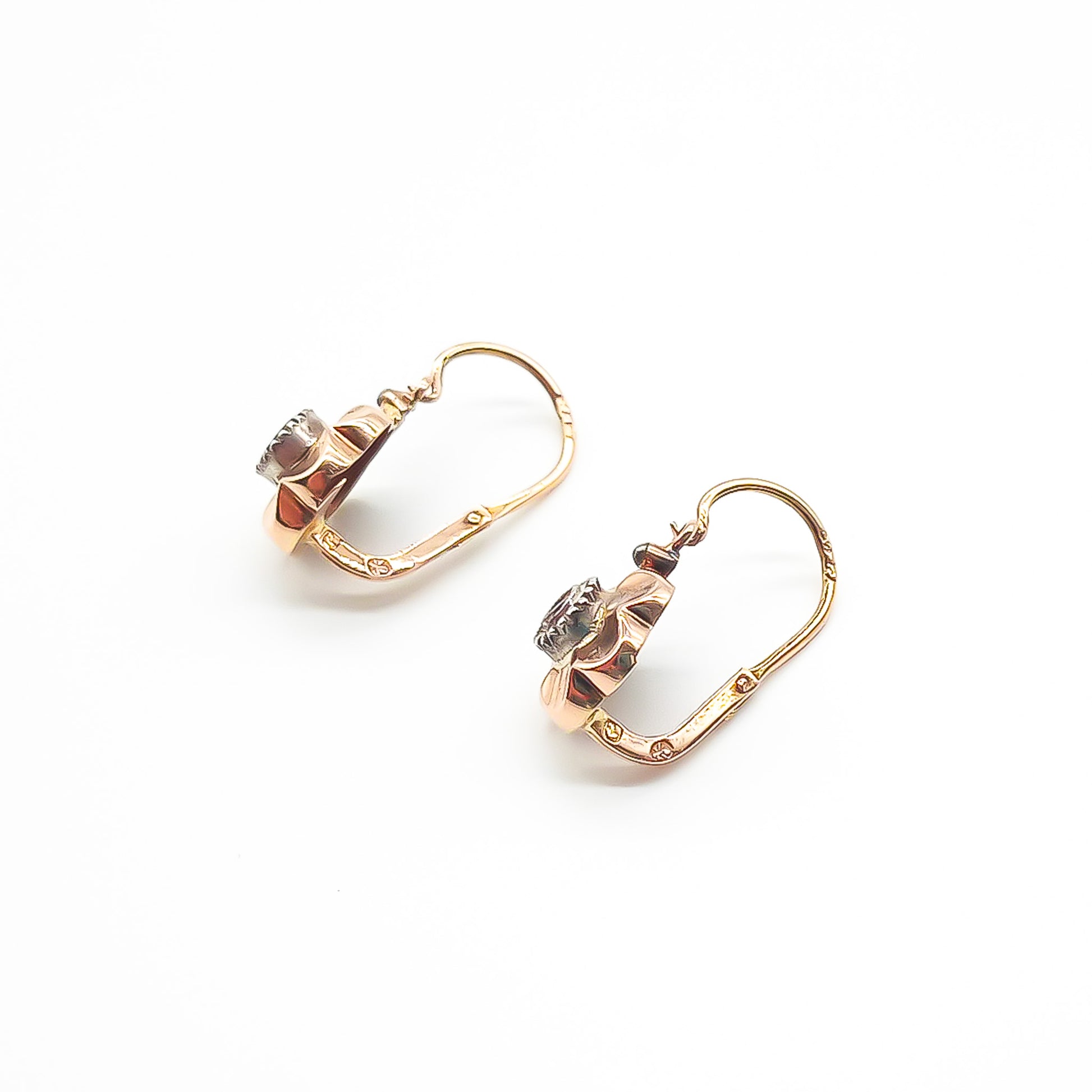Delicate 19ct rose gold flower drop earrings, each set with a single small diamond in a silver tube setting. Portuguese