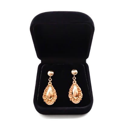 Dainty 9ct rose gold repousse drop earrings.