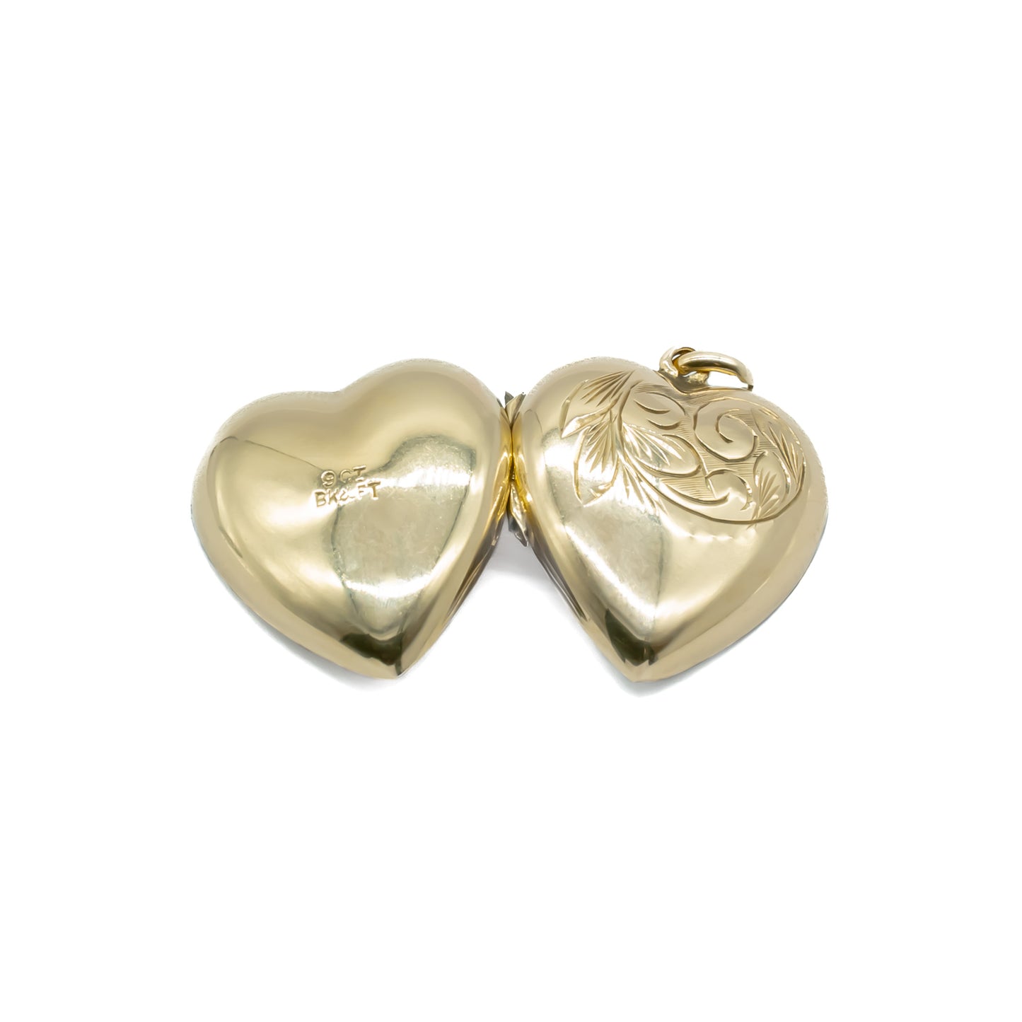 Lovely 9ct gold back and front beautifully engraved, heart shaped locket.