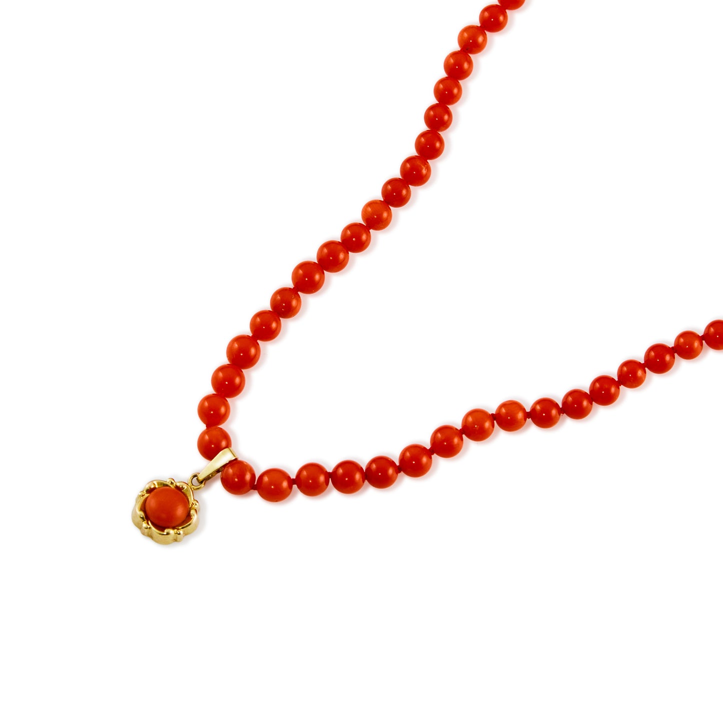 Natural red Mediterranean coral beads with a 9ct gold and coral pendant and a 9ct gold bolt ring clasp.