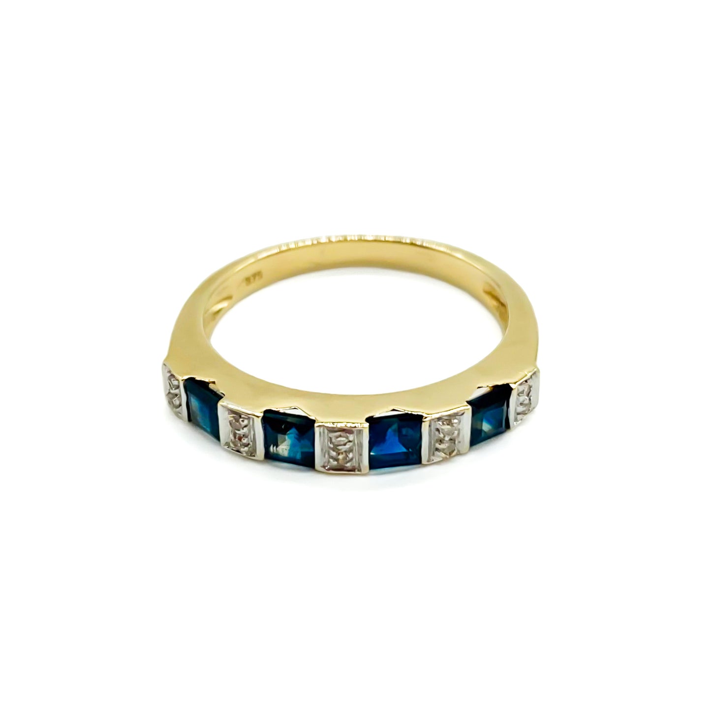 Classic vintage 9ct gold half eternity ring set with ten tiny diamonds and four natural, square sapphires. 