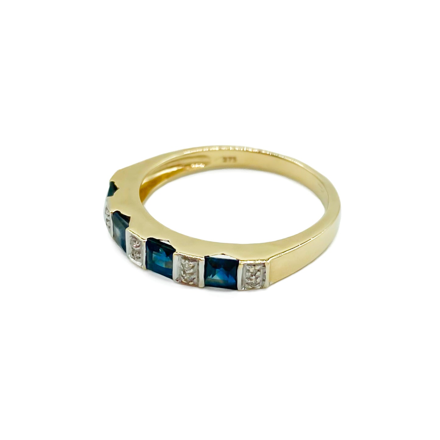 Classic vintage 9ct gold half eternity ring set with ten tiny diamonds and four natural, square sapphires. 
