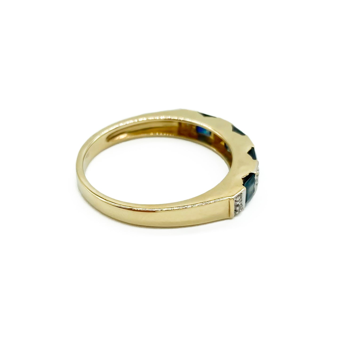 Classic vintage 9ct gold half eternity ring set with ten tiny diamonds and four natural, square sapphires. 