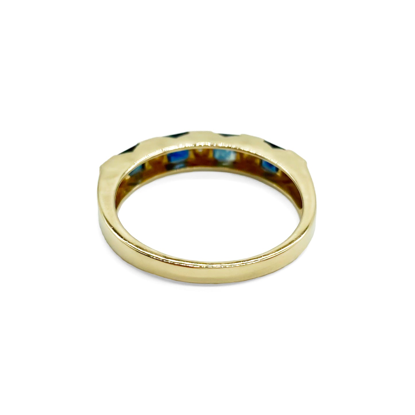 Classic vintage 9ct gold half eternity ring set with ten tiny diamonds and four natural, square sapphires. 