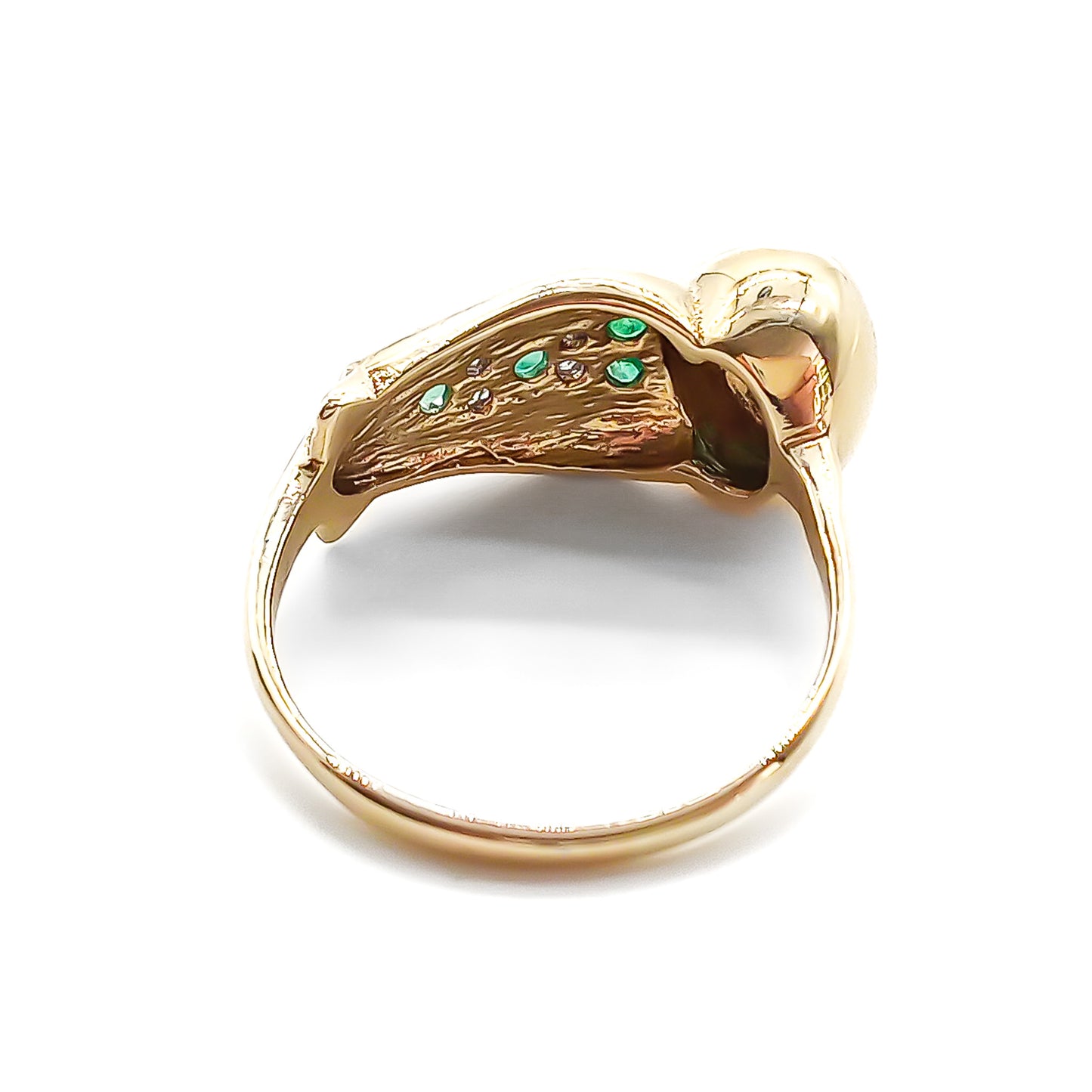 Charming vintage 9ct yellow gold ring in the shape of an owl, set with six emeralds and four small diamonds.