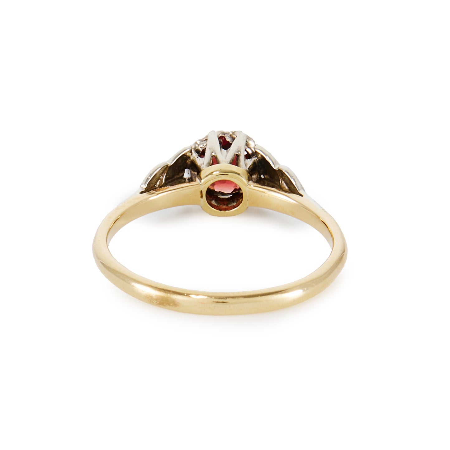 Pretty 9ct gold ring with a beautiful deep red garnet in a 9ct white gold setting with leaf detail, complemented by a yellow gold shank.