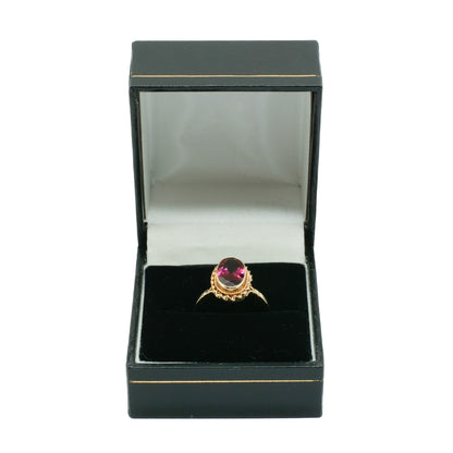 Classic 9ct yellow gold ring with beautifully faceted almandine garnet.  Circa 1940’s