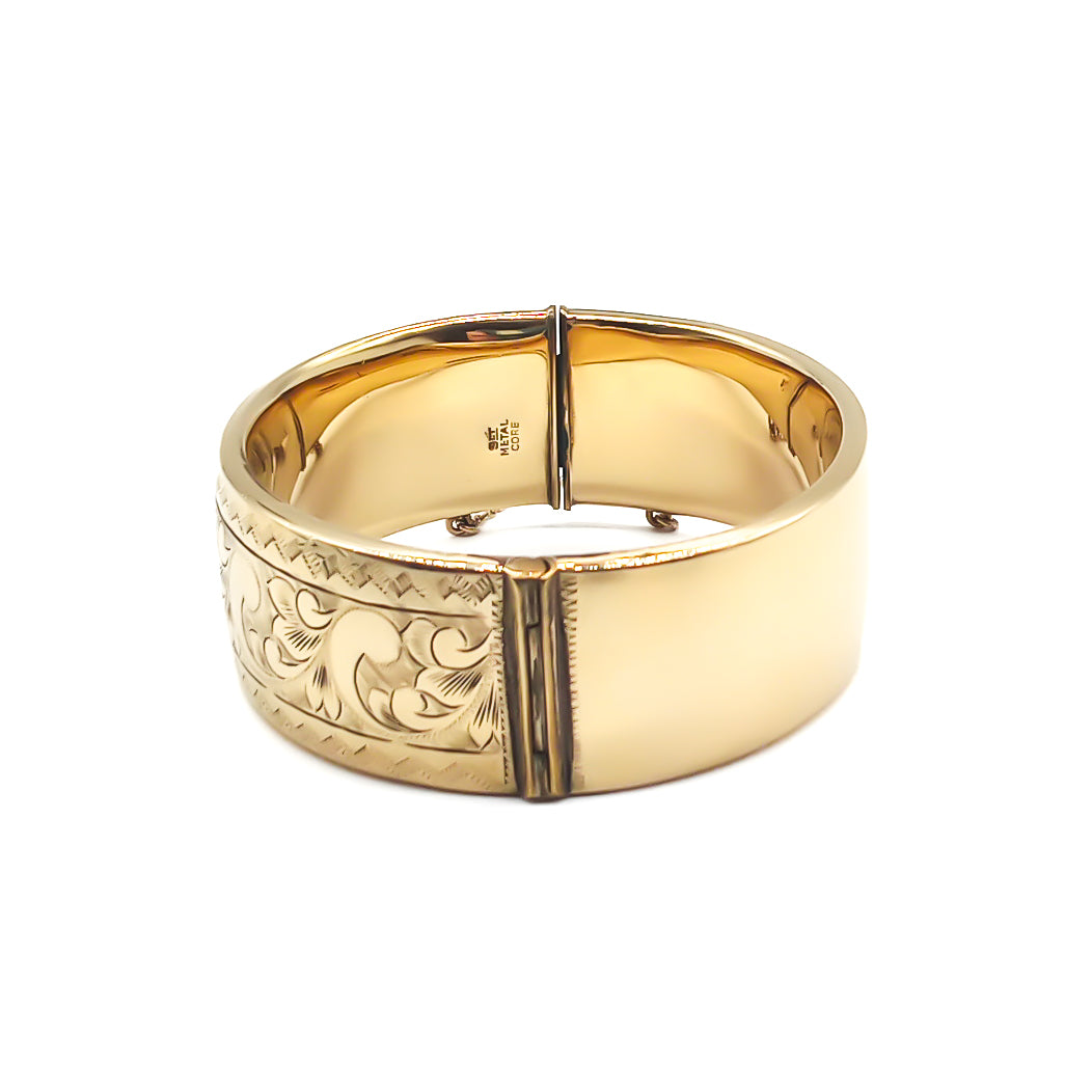 Stunning 9ct gold metal core bangle with beautiful engraving. Circa 1940’s