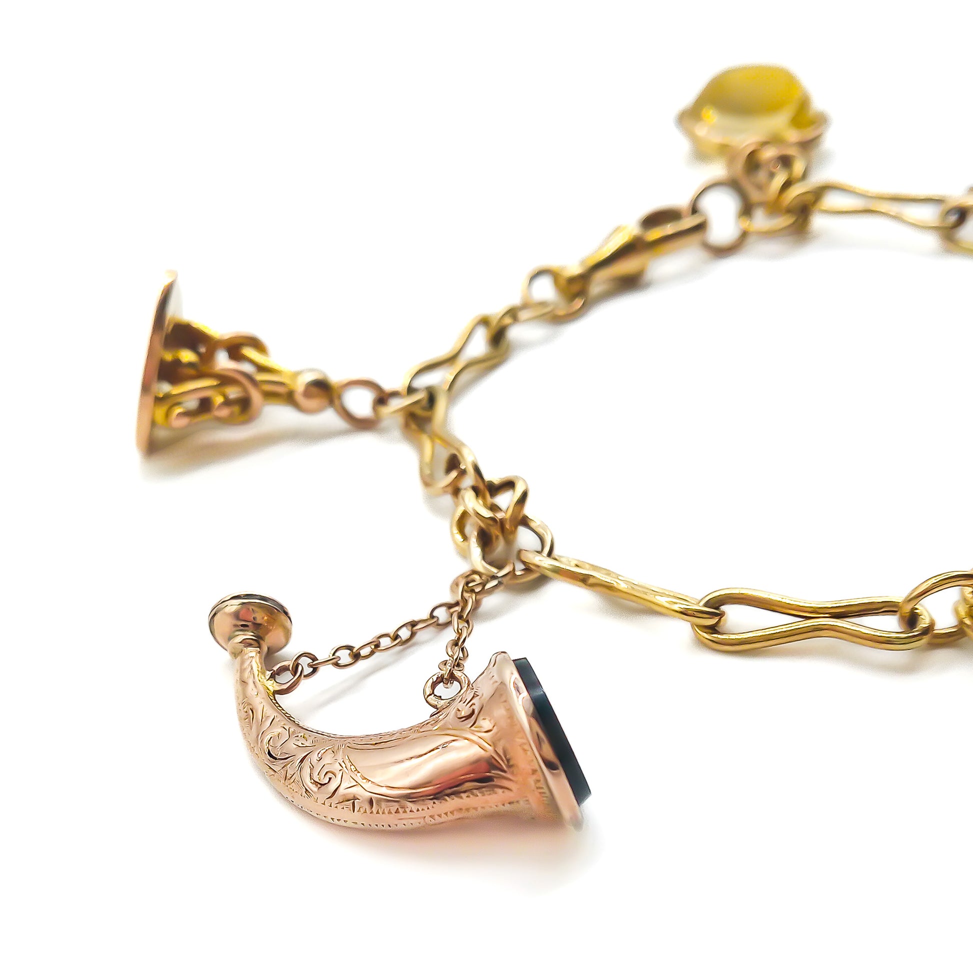 Very desirable Victorian 9ct yellow and rose gold bracelet with six unique seals and a dog clip.