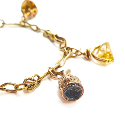Very desirable Victorian 9ct yellow and rose gold bracelet with six unique seals and a dog clip.