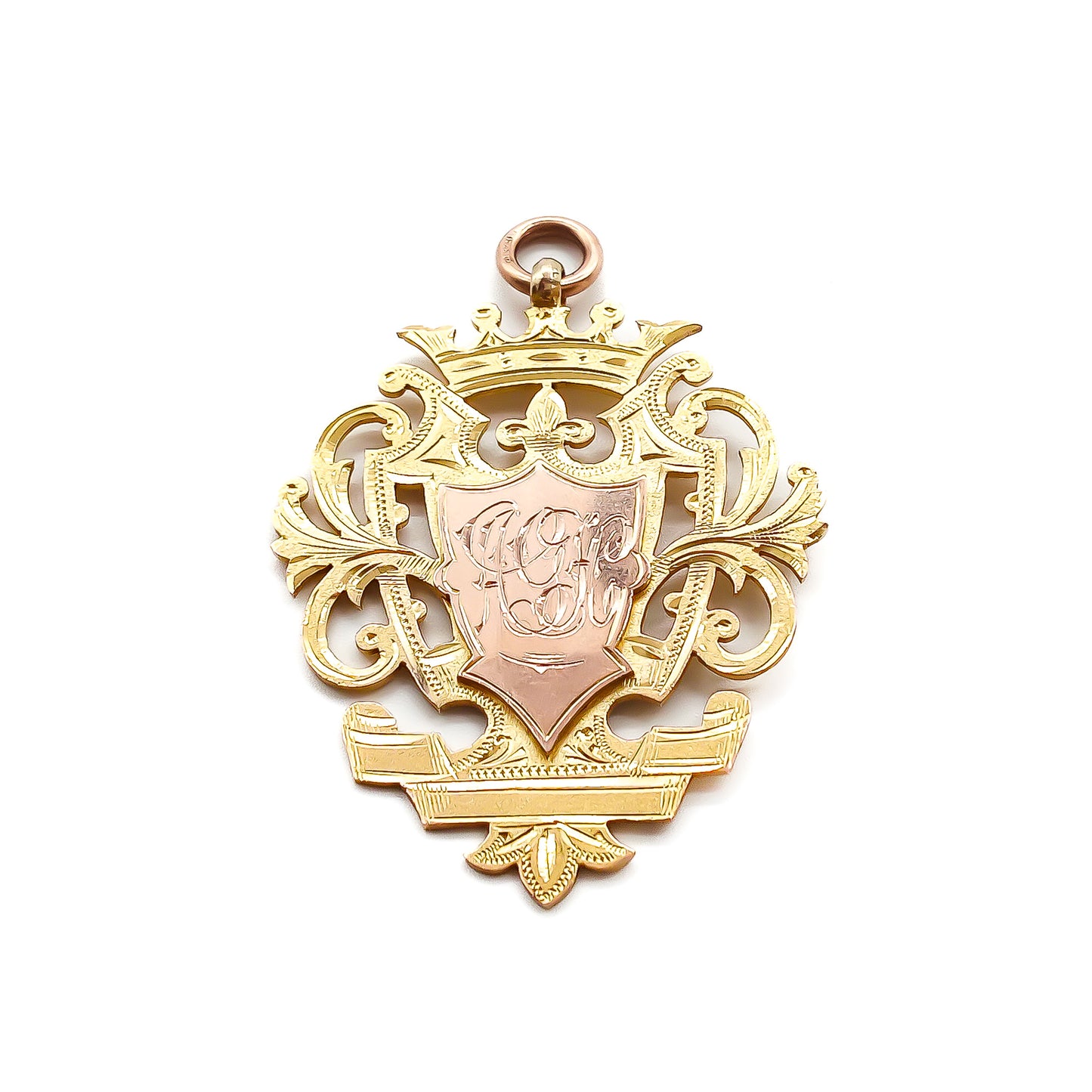 Very large 9ct rose and yellow gold beautifully engraved medallion with ornate detail. Hallmarked Birmingham 1886
