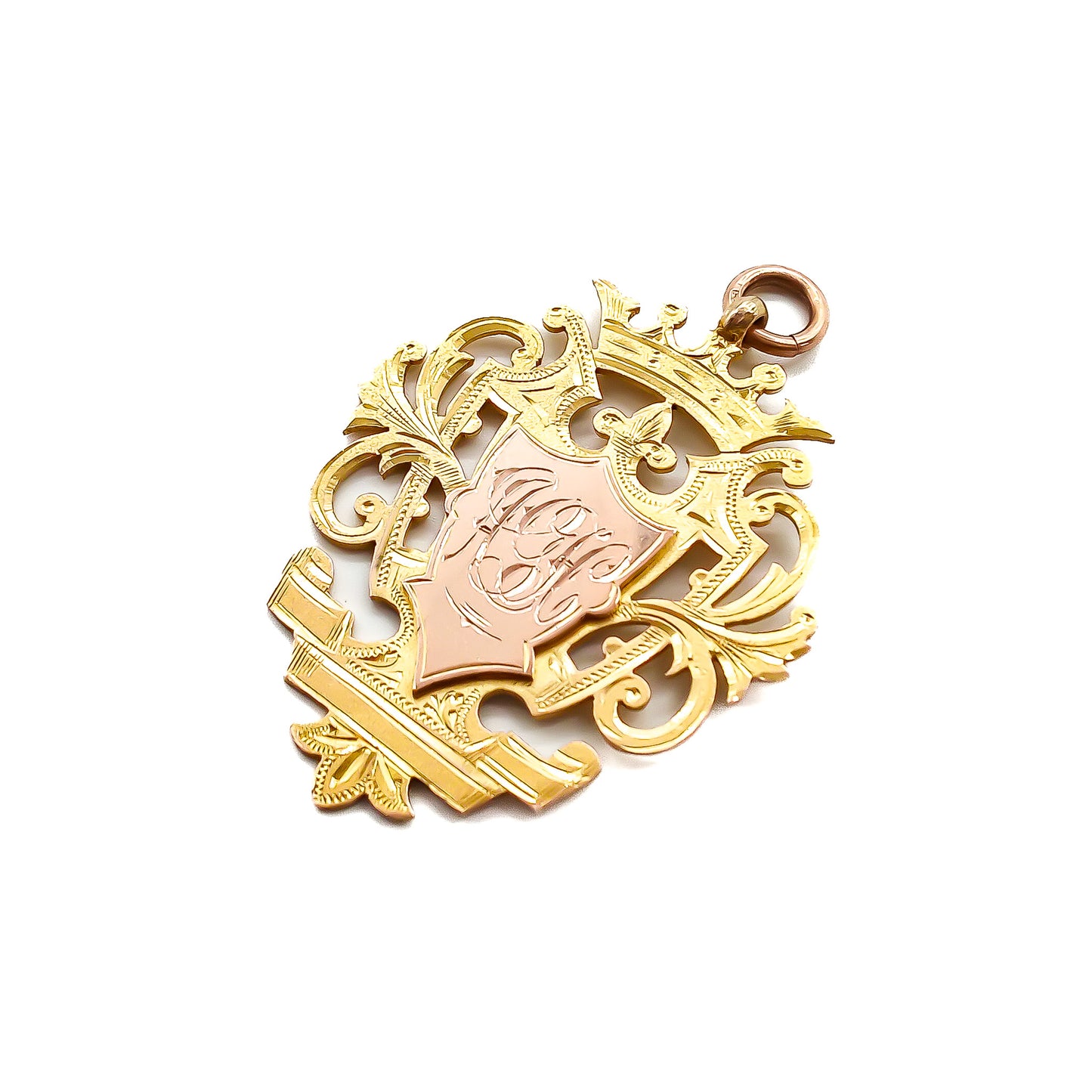 Very large 9ct rose and yellow gold beautifully engraved medallion with ornate detail. Hallmarked Birmingham 1886