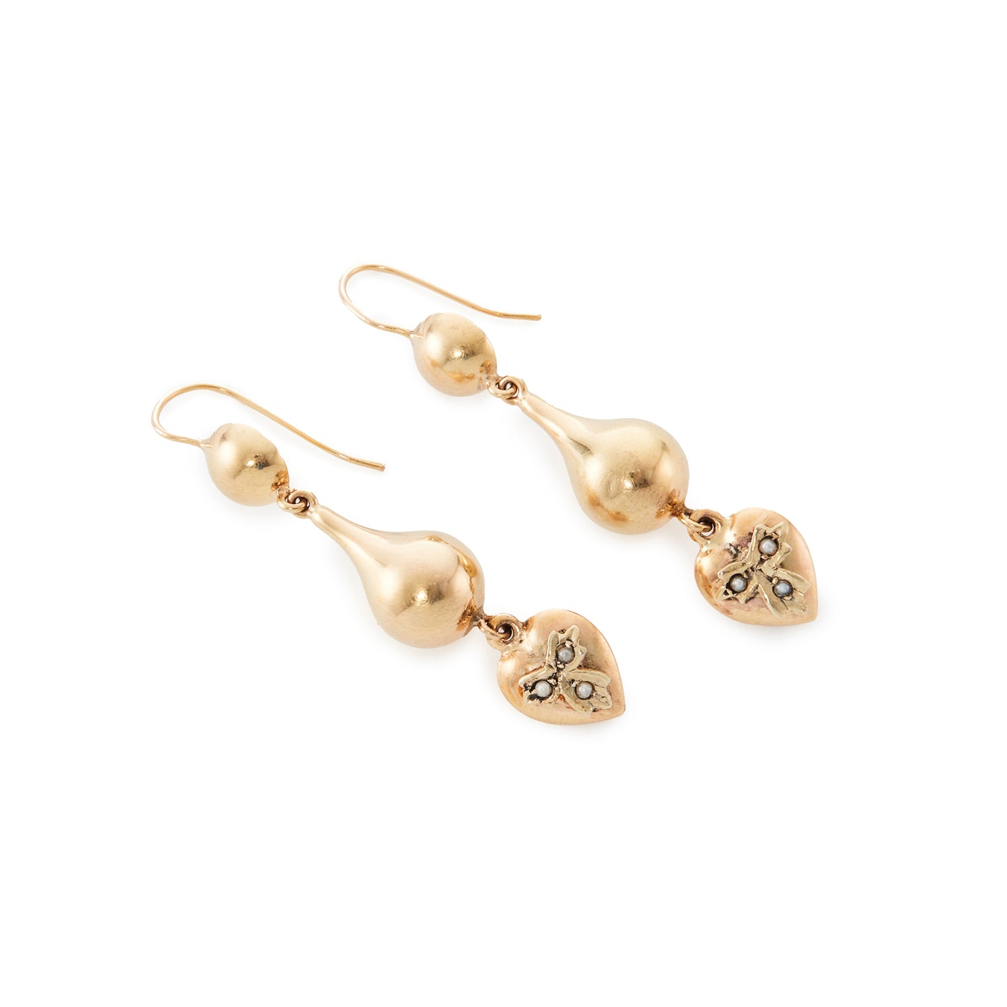 Stunning vintage 9ct yellow gold drop earrings, each with a dangling heart that is set with three seed pearls.