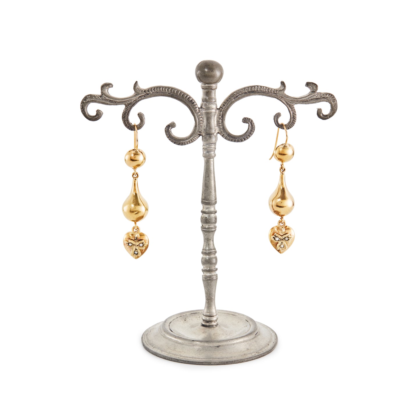 Stunning vintage 9ct yellow gold drop earrings, each with a dangling heart that is set with three seed pearls.