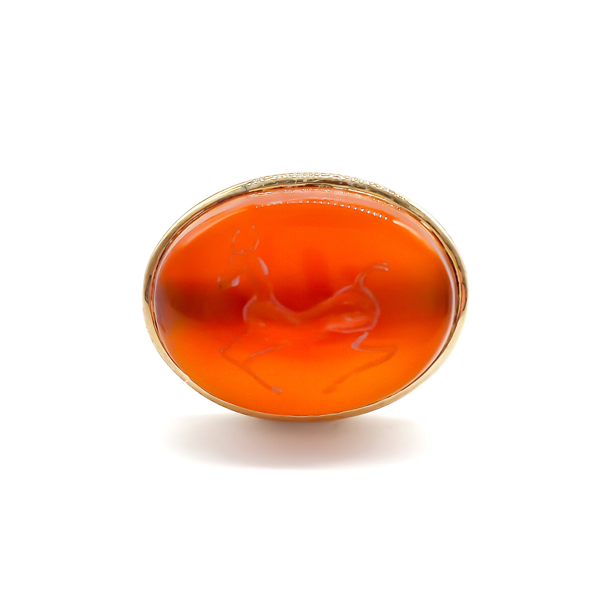 Unusual 9ct rose gold ring set with an antique oval carnelian intaglio depicting a stag.